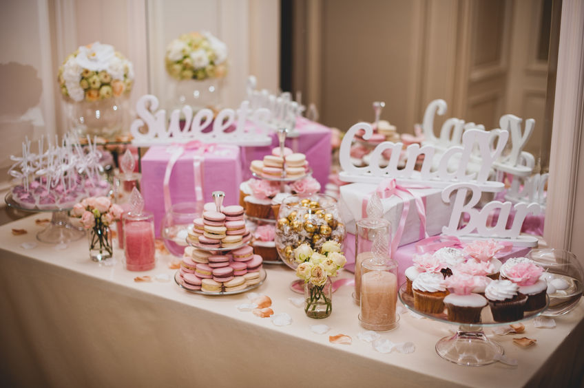 46910816 - party reception, decorated desert table pink color